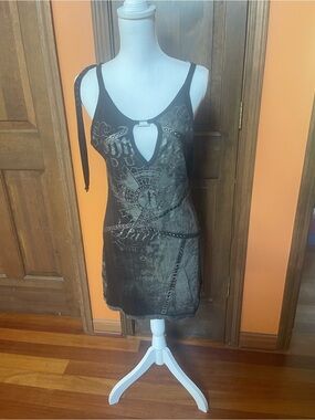 Vintage Salvage dress Size M with the 100%  metallic leather design